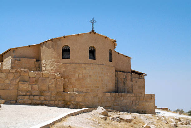 Mount Nebo Basilica, Jordan Mount Nebo, Madaba governorate, Jordan: façade of the Basilica built by the Franciscans over the ruins of the Byzantine church and monastery - location where Moses was granted a view of the Promised Land, just before his death - photo by M.Torres mount nebo jordan stock pictures, royalty-free photos & images