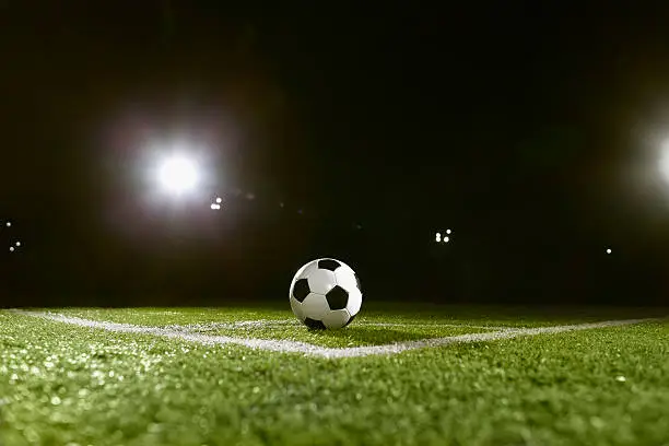 Photo of Soccer ball on sports field