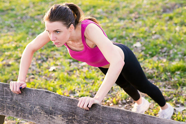 istock Woman working out in a park 517926388