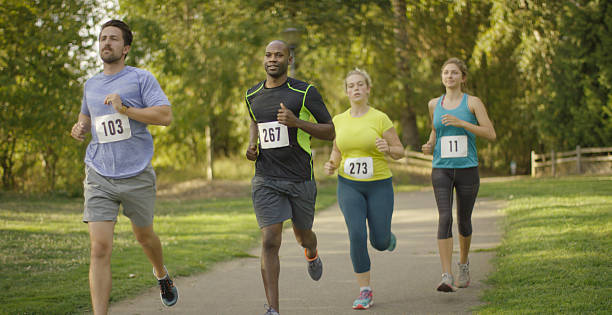 istock Group of runners running outdoors in a race 517926750