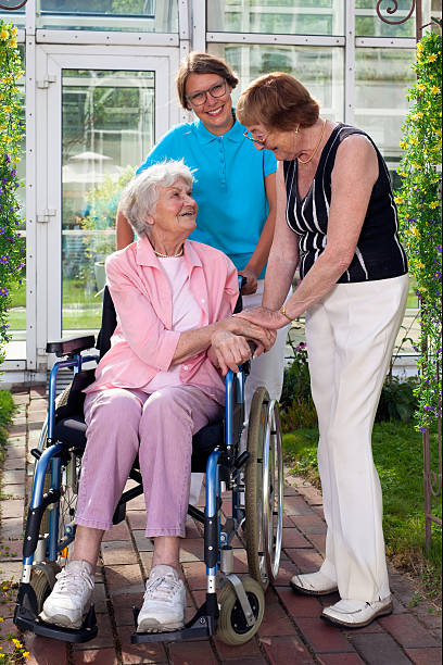 istock Care Takers for Elderly Outdoor Capture. 517927169