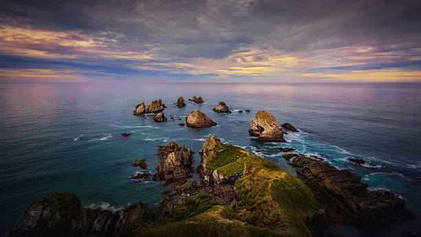 istock Nugget Islands On A Cloudy Morning Sunrise, Catlins 517927476