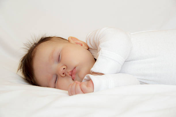 istock Little newborn girl slepping 517927862