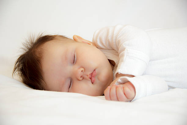 istock Little newborn girl slepping 517927902