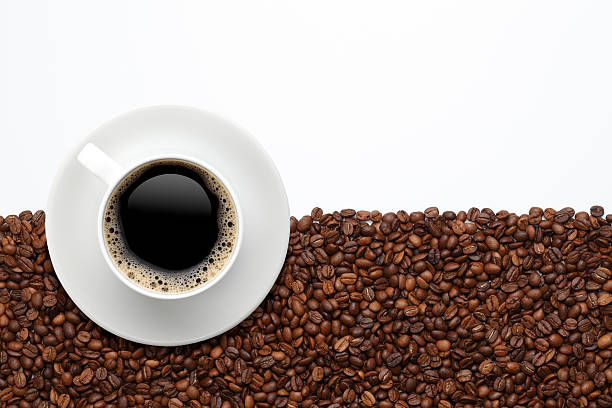 istock Cup of coffee on beans 517927929