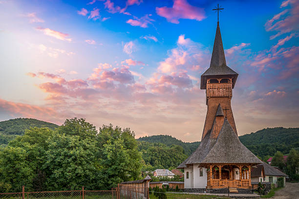 Church in Maramures Church in my native town, in a suburb. A beautiful sunset time...ready to show it to the world! maramureș stock pictures, royalty-free photos & images