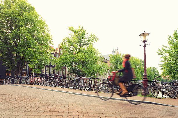 istock Bicyclist cycling in Amsterdam 517929012