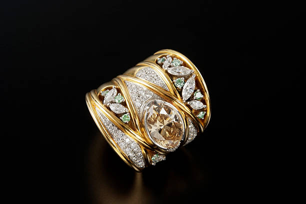 istock Vintage gold and diamond ring on black background 517929083