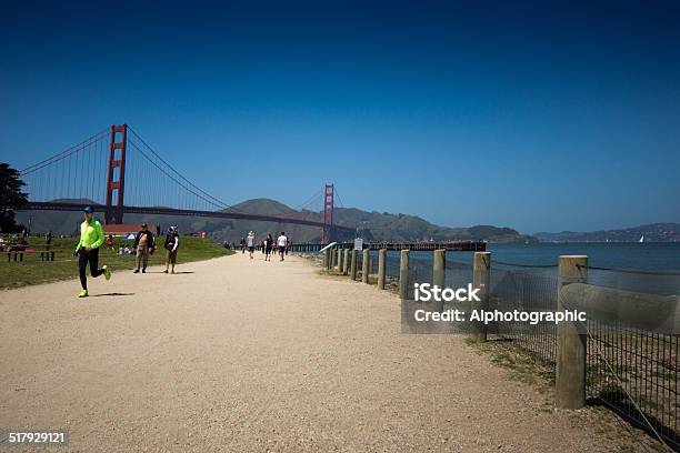 Jogging Near Golden Gate Bridge Stock Photo - Download Image Now - Activity, Bay of Water, Bridge - Built Structure