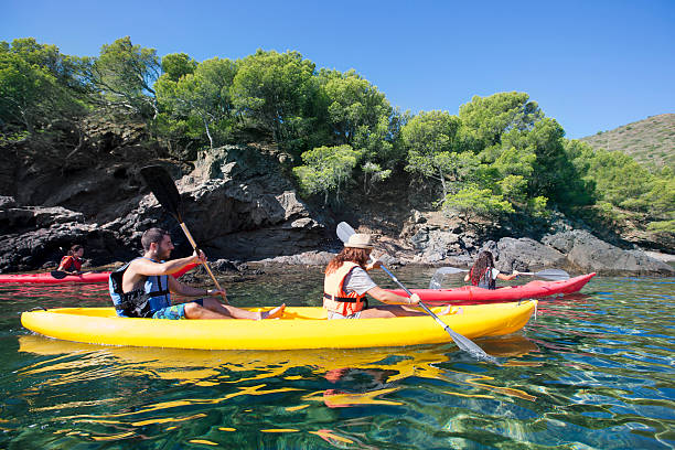 istock Four friends having fun with the kayak 517929889