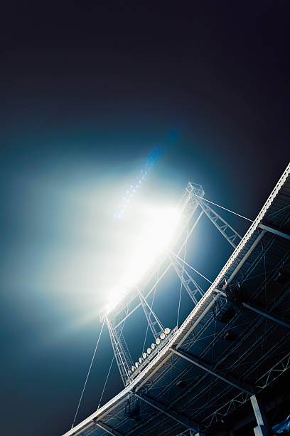 istock View of stadium lights at night 517930248