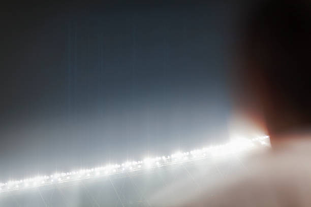 istock View of stadium lights at night 517930370