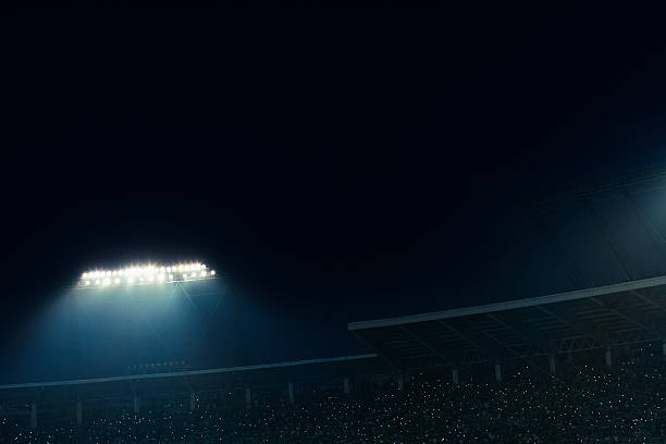 istock View of stadium lights at night 517930790
