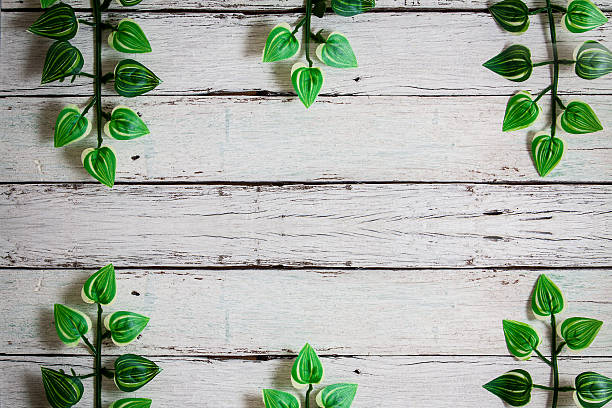 istock flowers on wooden background 517931328