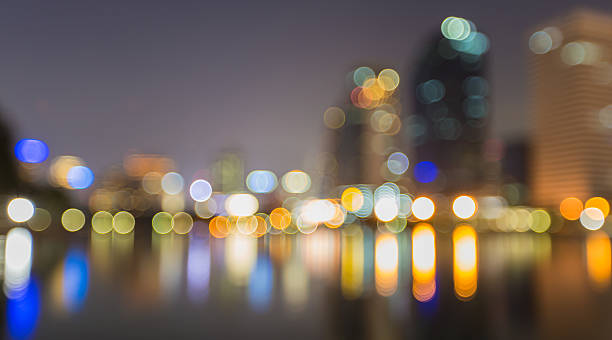 istock Abstract, night cityscape light blur bokeh, defocused background. 517931439