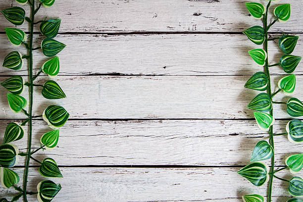 istock flowers on wooden background 517931700