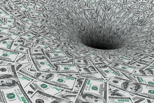 Concepto de Crisis. Flujo de dinero en agujero negro photo