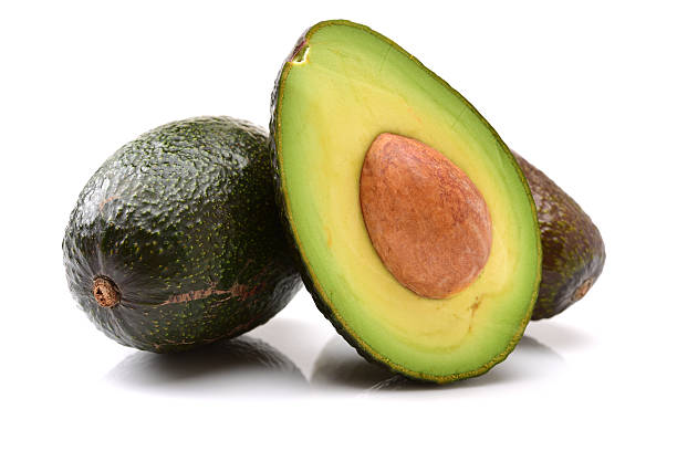 istock whole and half avocados 517934152