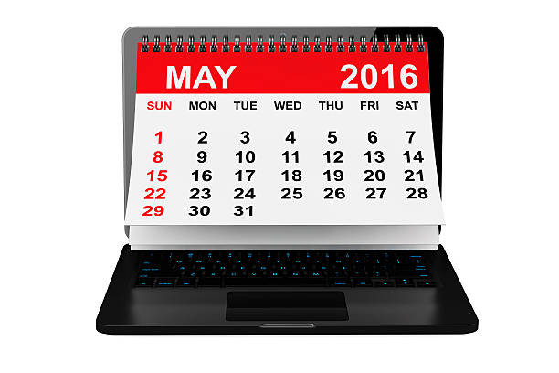 istock May 2016 calendar over laptop screen 517934504