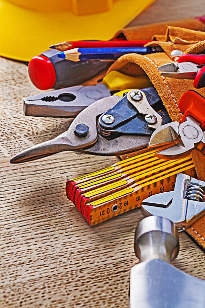 istock Set of construction equipment on wooden board 517936072