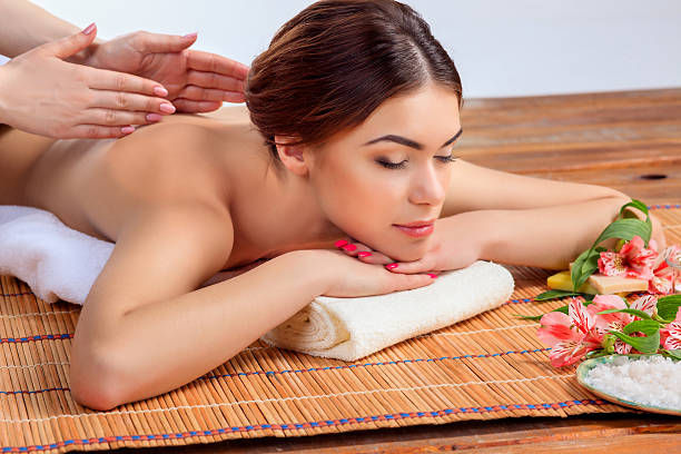 istock Beautiful young woman at a spa salon 517937872