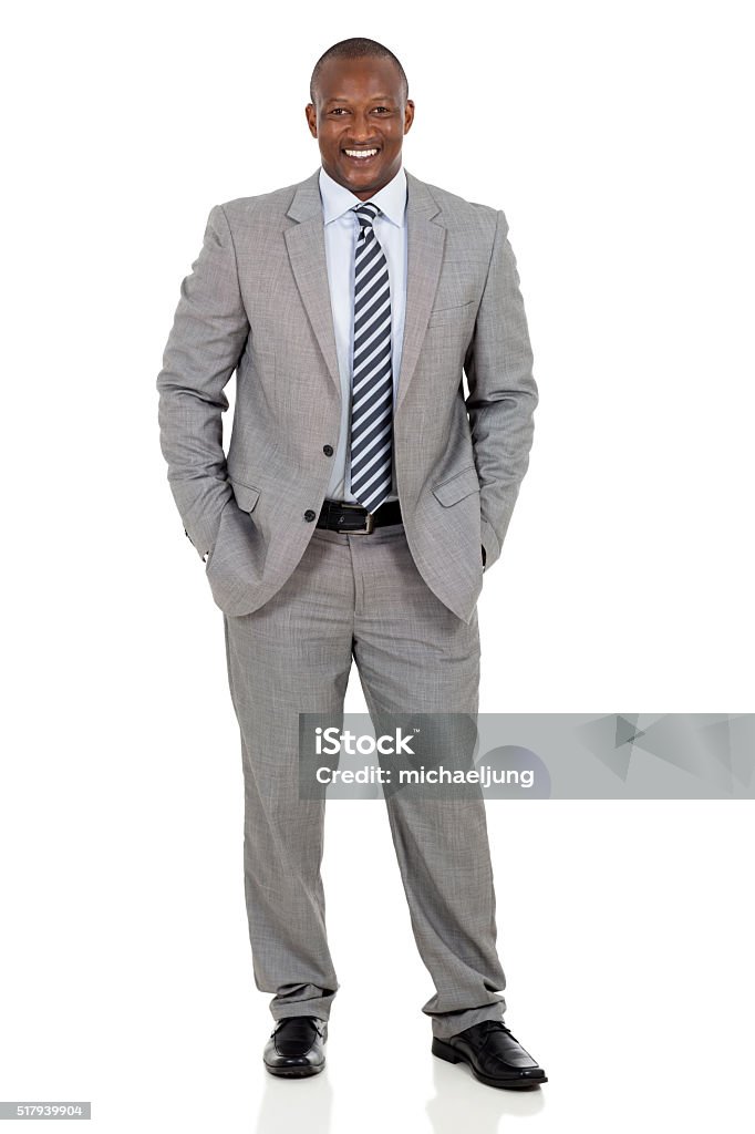 Afroamericana hombre de negocios de pie - Foto de stock de Hombres libre de derechos
