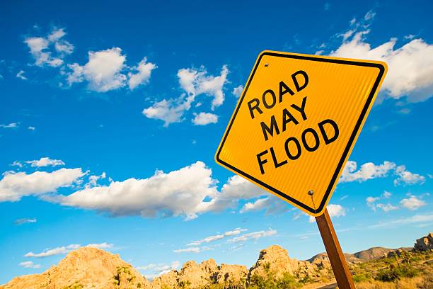 istock Road May Flood Warning Sign 517955017