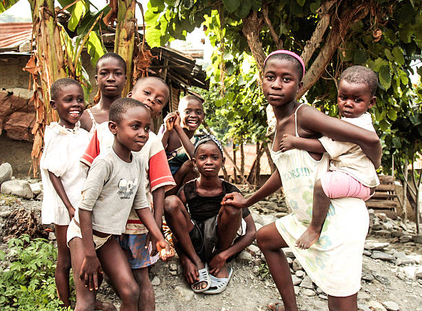 Higuey, Dominican Republic - November 19, 2014: portrait of smiling haitian children in refugee camp in Dominican Republic