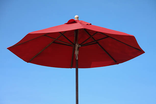 istock Beach Umbrella and blue sky 517958411