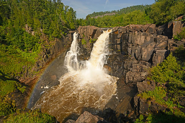 Rainbow by Spectacular Falls in the Summer