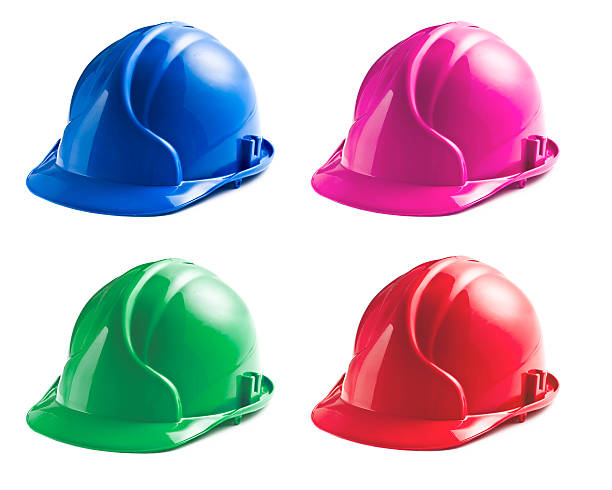 various colors of hard hats on white background