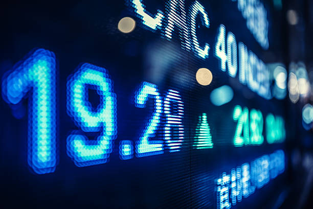 istock display stock market numbers and graph 517963176