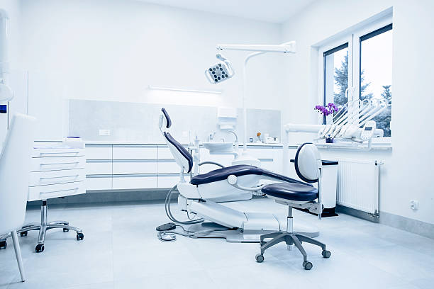 Modern dental practice. Modern dental practice. Dental chair and other accessories used by dentists. dentists office photos stock pictures, royalty-free photos & images