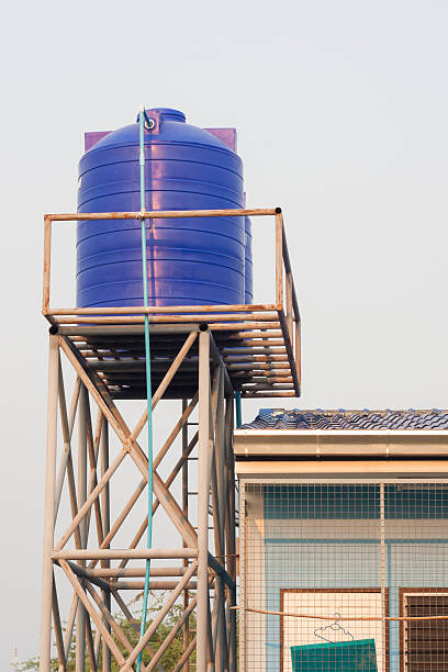 istock Blue water tank on the tower. 517966282