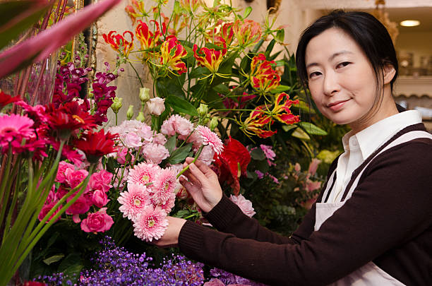 flower shop woman stock photo
