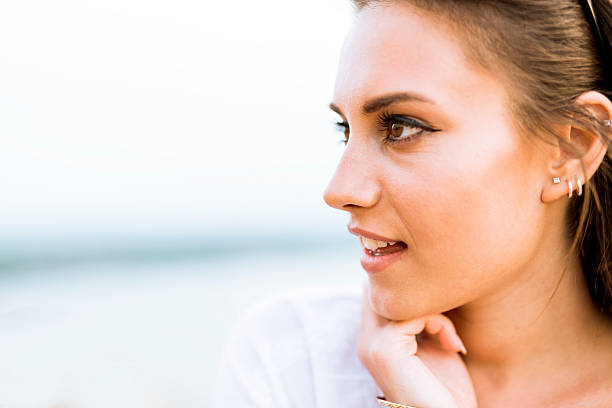 istock Beautiful young woman profile shot 517970894