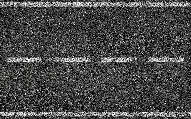 istock White Stripes On Asphalt Road 517971104