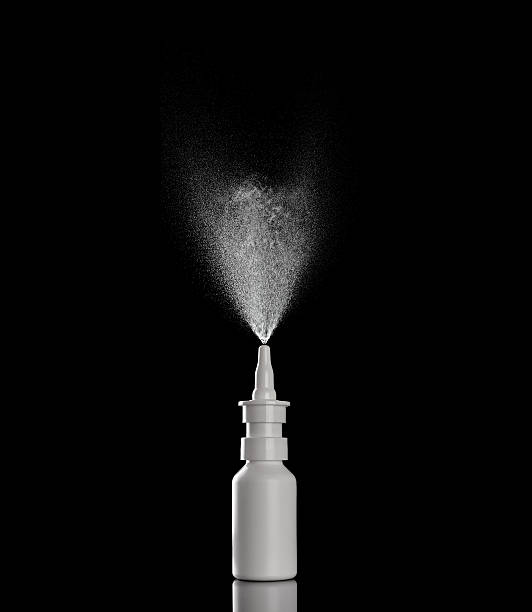 spray bottle liquid perfume drop close up of  a spray bottle drops on black backgroundclose up of  a spray bottle drops on black background nasal spray stock pictures, royalty-free photos & images