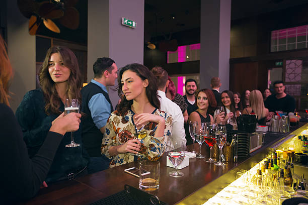 istock Drinking cocktails at nightclub 517973068