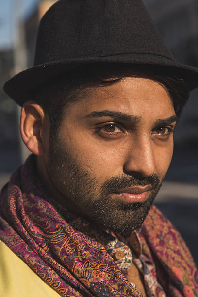 istock Indian handsome man posing in an urban context 517973198