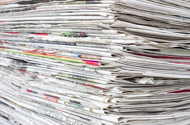 istock Pile of newspapers 517973338