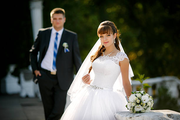 istock Happy bride and groom on their wedding 517973836