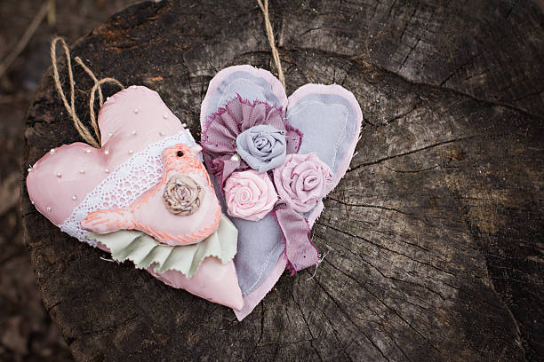 istock Hand-made hearts  on the old board 517974862