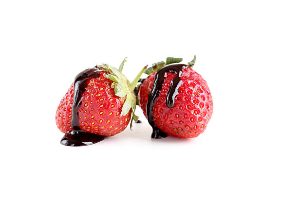 istock Strawberry in chocolate isolated on a white 517975266