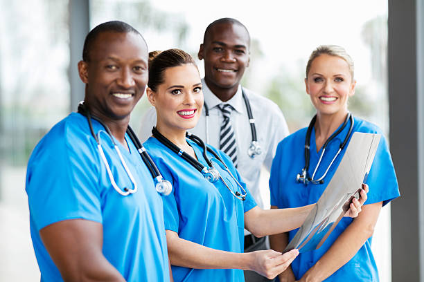 istock medical doctors with patient's x-ray 517975766