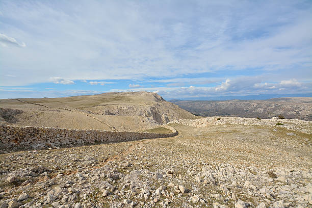 istock Stone wall landscape at Krk island 517975996