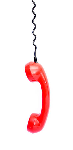 istock Red retro telephone tube isolated on white background. 517976452