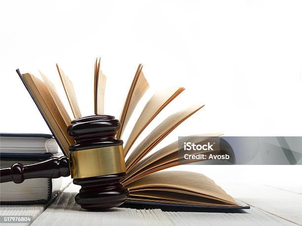 Open Law Book With Wooden Judges Gavel On Table In Stock Photo - Download Image Now - Book, Ruler, Law