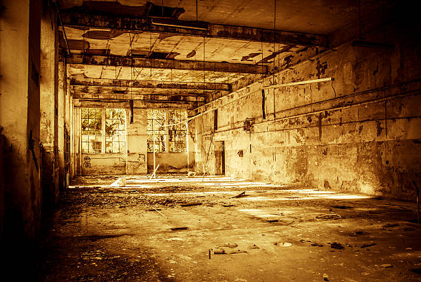 istock abandoned industrial building - monochrome style image 517977052