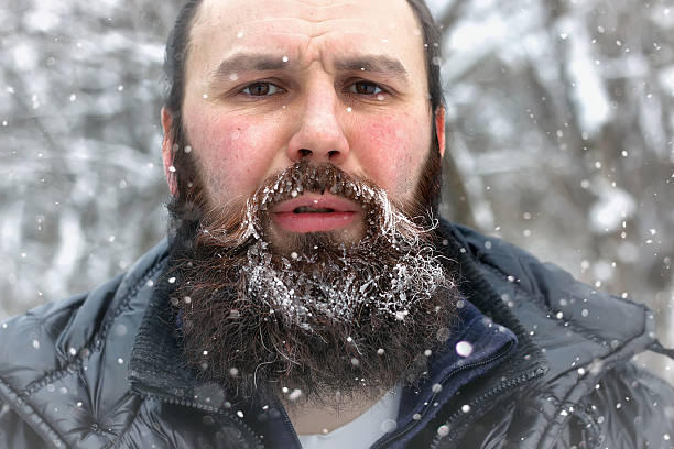istock bearded man ice snow winter 517987870
